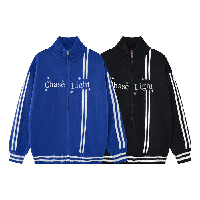 Front view of blue and black knit zip-up jackets with white striped sleeves, ribbed cuffs, and Chase Light lettering