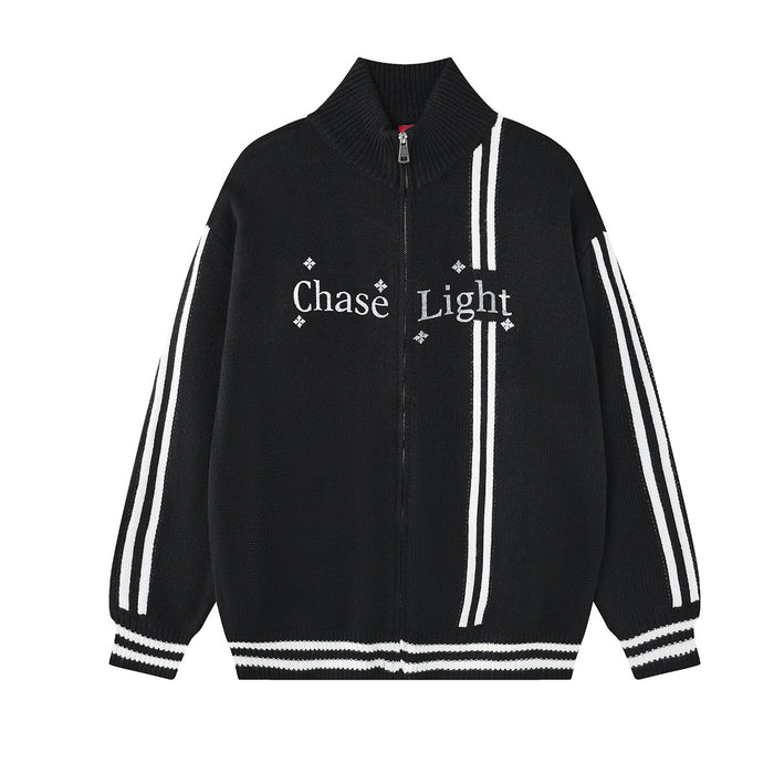 Front view of a black knit zip-up jacket with white sleeve stripes, ribbed trim, and Chase Light lettering