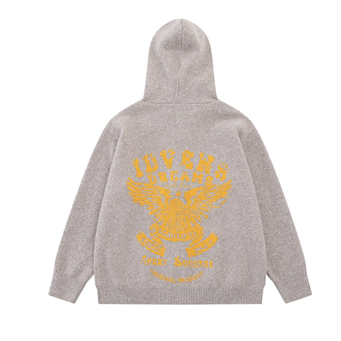 Light beige knit zip-up hoodie shown from the back with a large golden eagle graphic and text