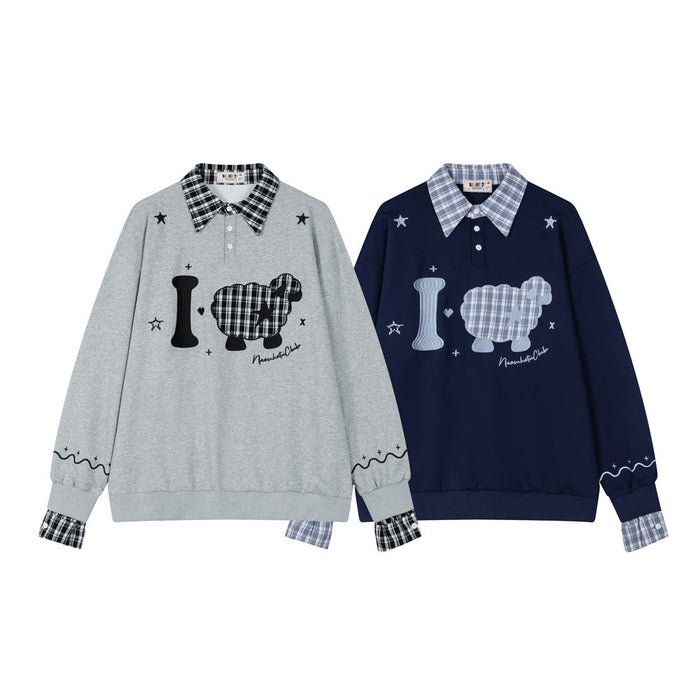 Front view of gray and navy plaid-collar sweatshirts with sheep appliqués and patterned cuffs