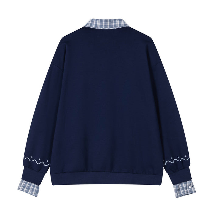Back view of the navy sweatshirt with a plaid collar, plain body, and decorative sleeve cuffs