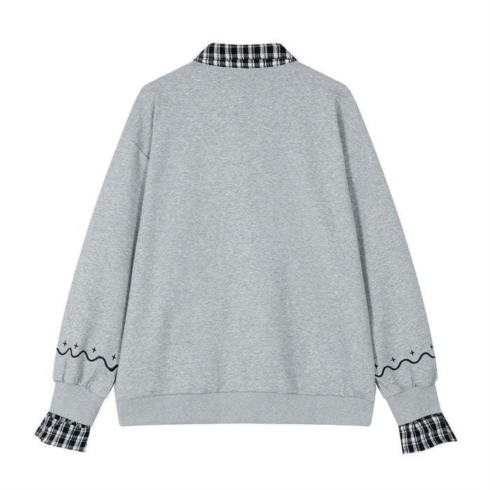 Back view of the gray sweatshirt with a plaid collar, plain body, and wavy sleeve details