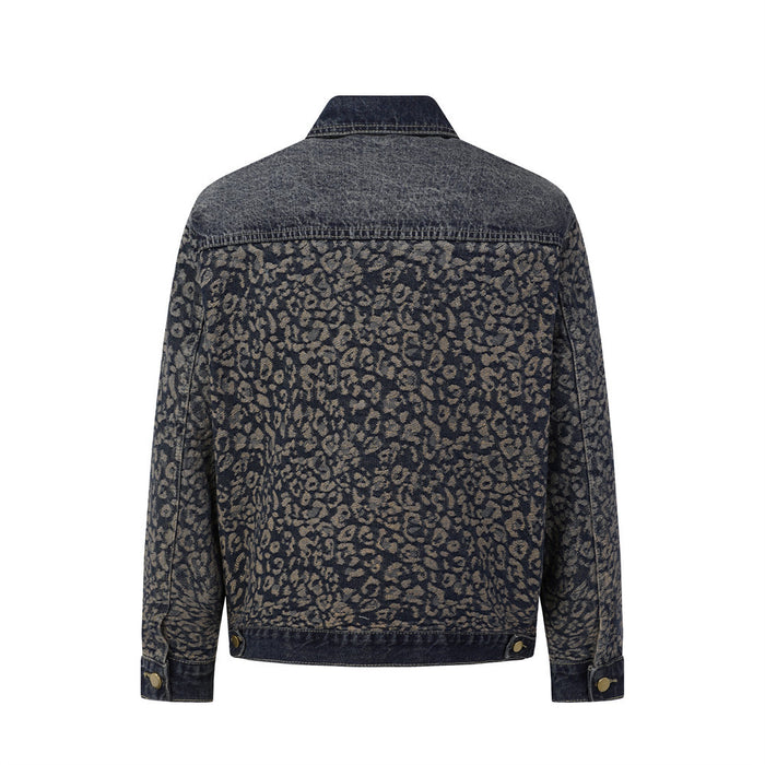Back view of a dark washed denim jacket with an all-over tan leopard pattern and pointed collar