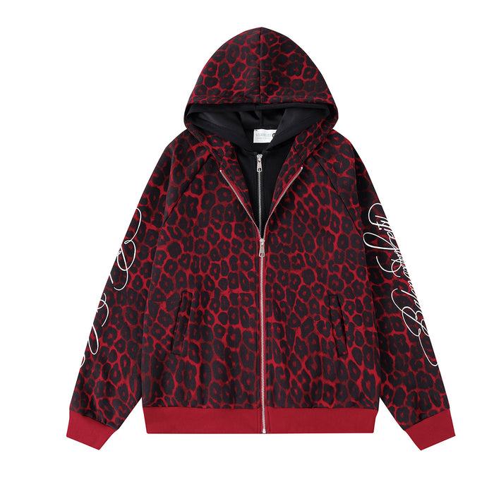 Oversized red and black leopard print zip-up hoodie jacket with white cursive script sleeve graphic and contrasting black hoo