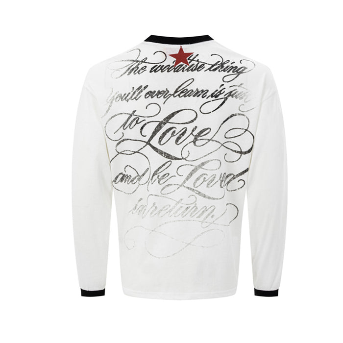 Back of a white long sleeve shirt featuring large black script lettering and a red star near the collar