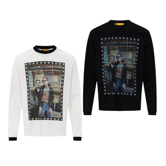 White and black long sleeve crew neck shirts displayed front-facing with matching framed photo graphics