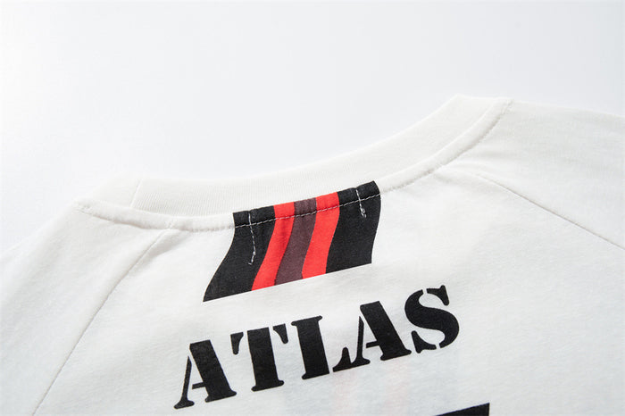 Close-up of the back neckline with a black-red wavy stripe insert above the ATLAS lettering