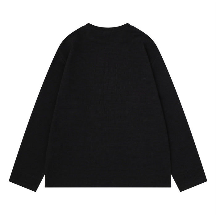 Plain black long sleeve crew neck shirt shown from the back