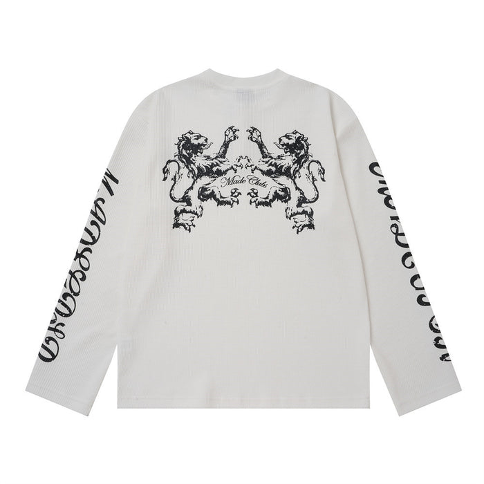 White shirt back with a large black two-lion gothic graphic and script lettering on the sleeves