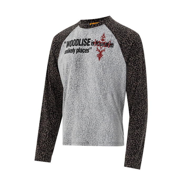 Front view of gray raglan tee with brown-black leopard-print sleeves and Woodlise graphic across the chest