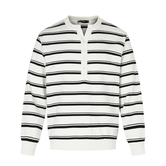Front view of a white knit henley sweater with horizontal black stripes and a buttoned placket