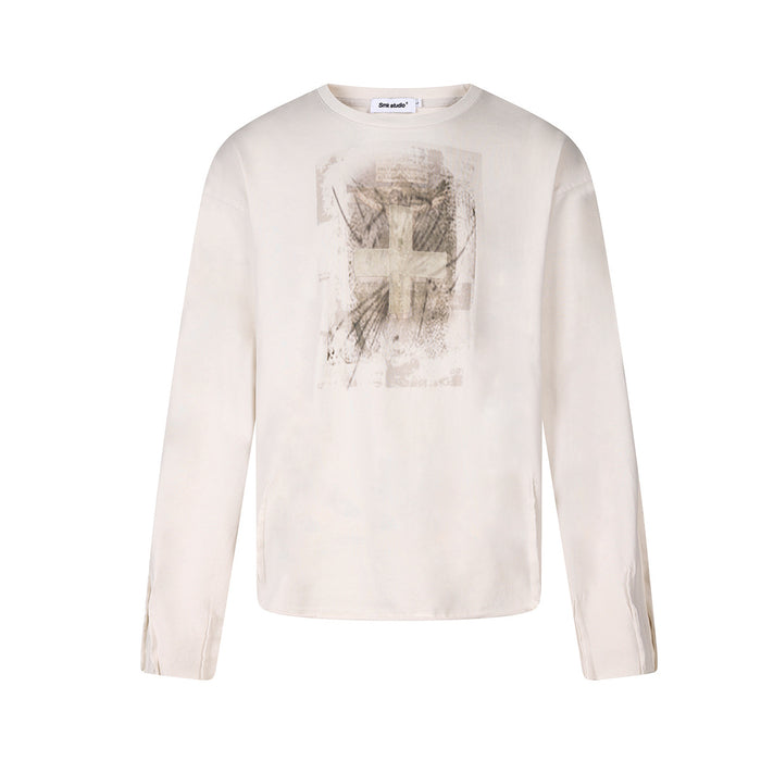 Smk Studio off-white long sleeve shirt with distressed cross graphic print on chest, split cuffs, relaxed boxy fit, front and