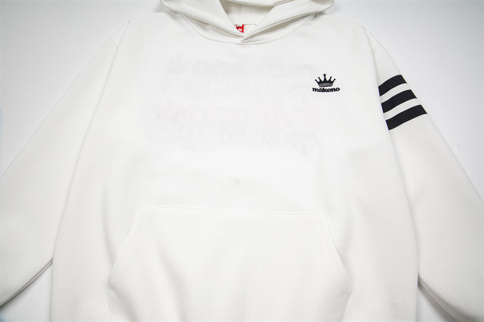 Close view of the white hoodie front showing the black crown logo, kangaroo pocket, and striped sleeve