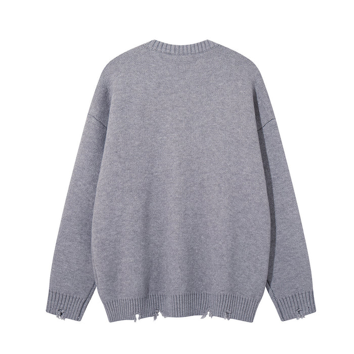 Plain gray knit crewneck sweater shown from the back with ribbed cuffs and a distressed hem