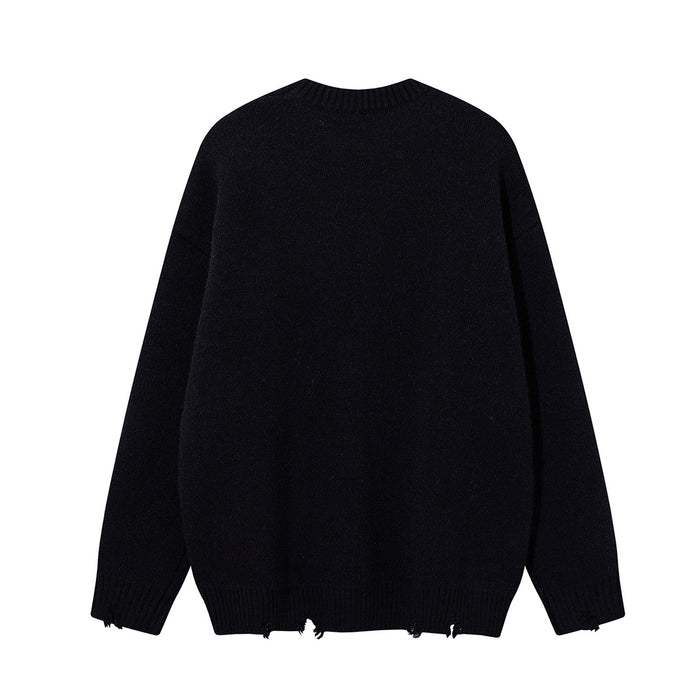 Plain black knit crewneck sweater shown from the back with ribbed cuffs and a frayed hem