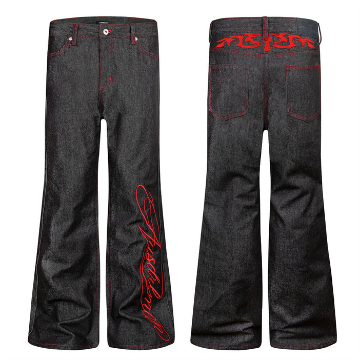 Black bootcut jeans shown side by side from front and back with red stitching and embroidery