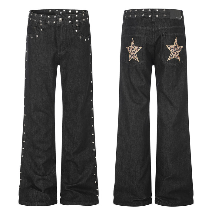 Men's black bootcut denim jeans with silver rivet side seams and leopard-print star patches on back pockets