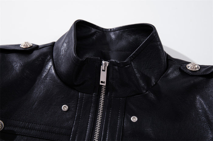 Close-up of the black jacket's stand collar, silver zipper, and shoulder epaulets
