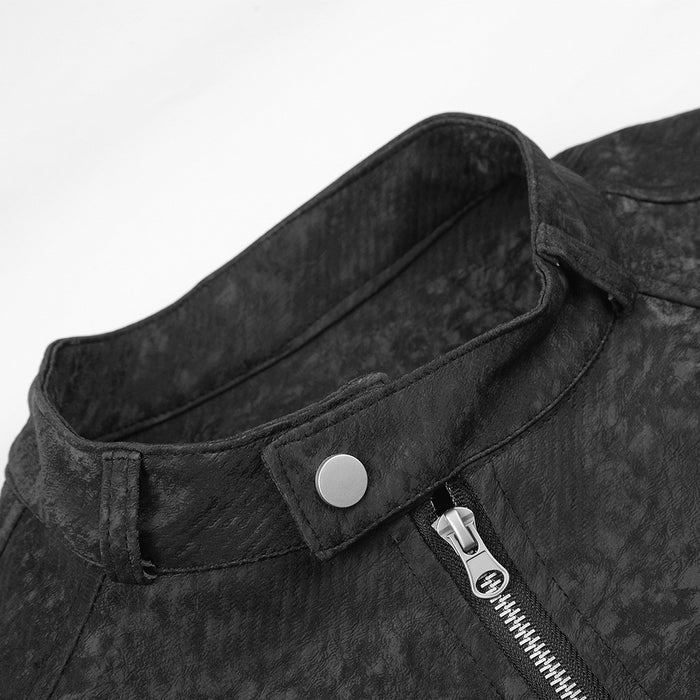 Close-up of the black jacket's stand collar with snap fastening and silver front zipper