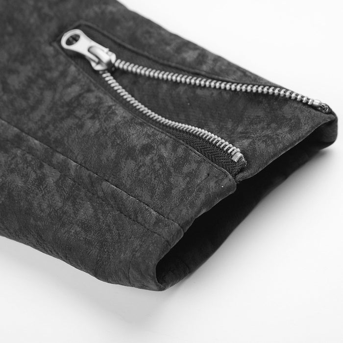 Close-up of the black jacket sleeve cuff with a silver zippered opening and textured fabric