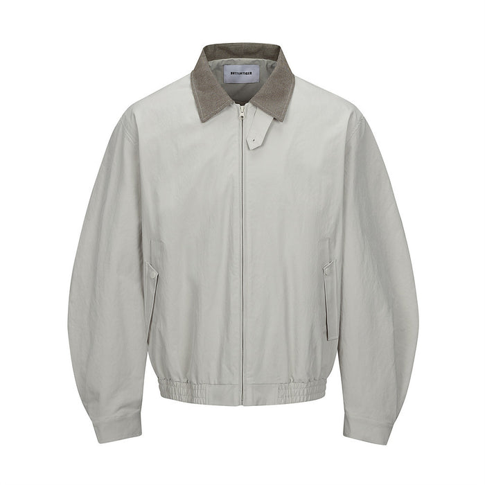 Light gray bomber jacket front view with a brown houndstooth collar, zip closure, and angled pockets