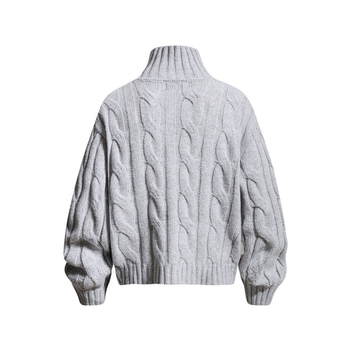 Light gray cable knit mock neck sweater shown from the back with braided knit texture and ribbed trim