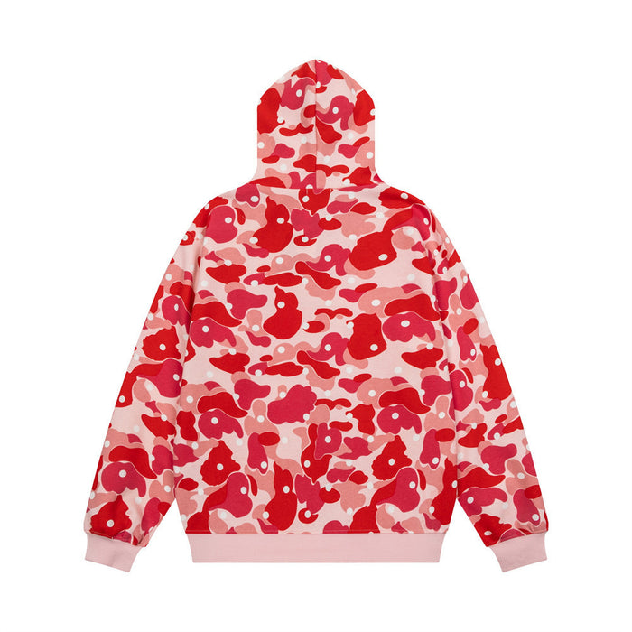 Red and pink camouflage zip-up hoodie shown from the back with a hood and ribbed hem