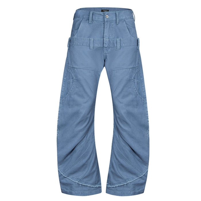 Front view of blue wide-leg pants with a double waistband, curved leg seams, utility pockets, and raw hems