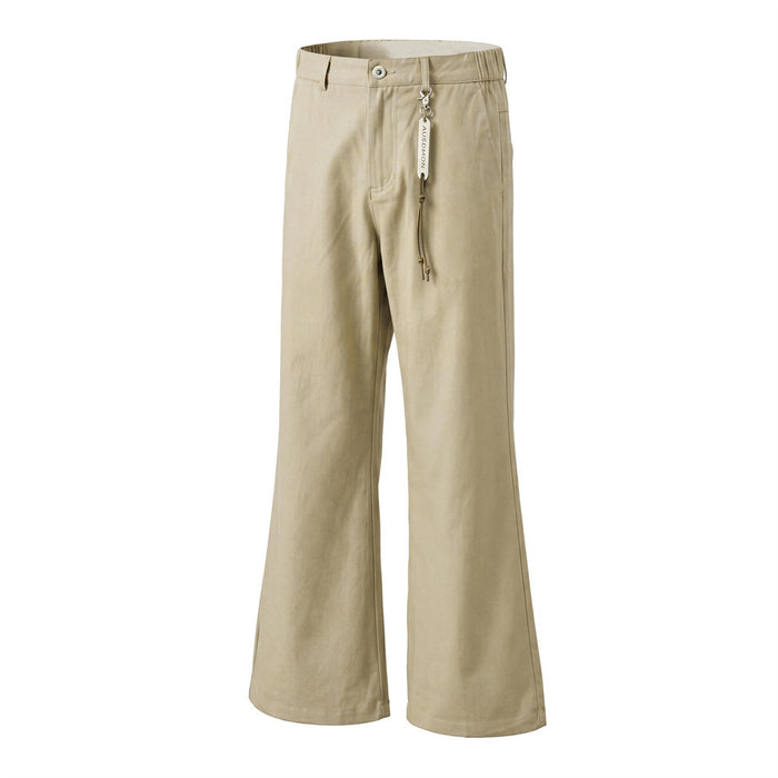 Beige flared trousers in a slight angled front view with belt loops, button closure, pocket, and hanging tag