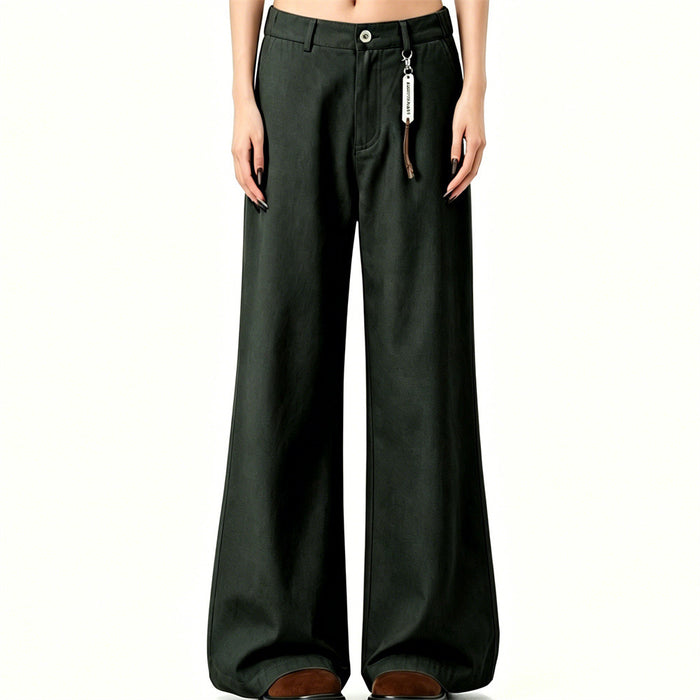 Dark green wide-leg trousers worn in a straight front view with a hanging tag and relaxed flared legs