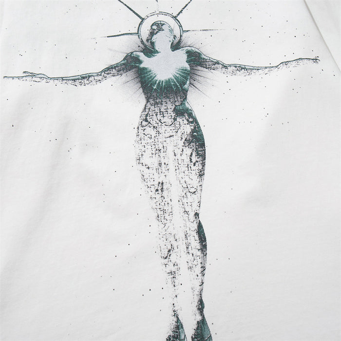 Close-up of the distressed teal and black figure graphic printed on the white T-shirt front