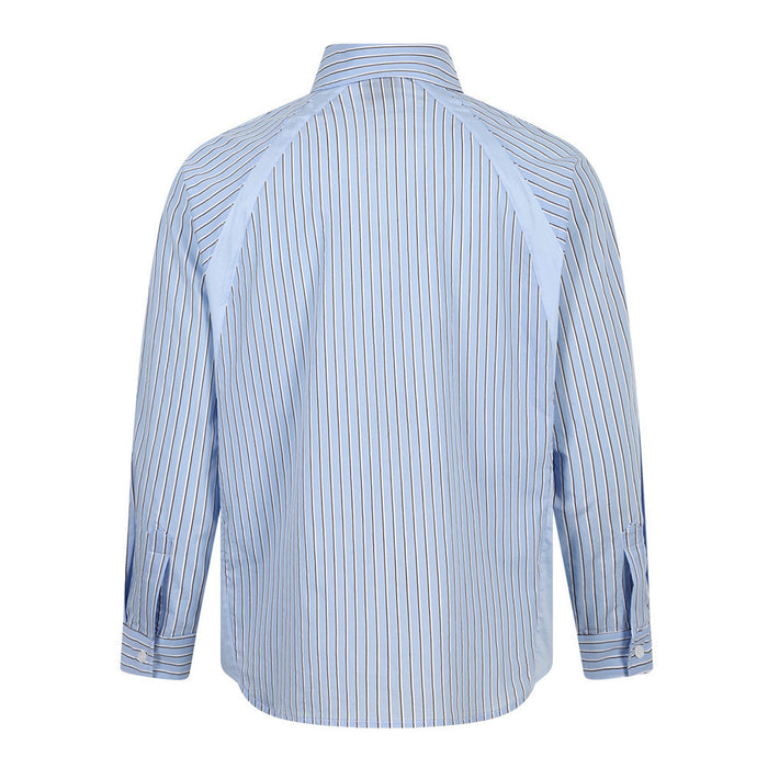 Back view of a light blue striped long-sleeve button-down shirt with a pointed collar and rounded hem