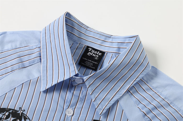 Close-up of the light blue striped shirt collar, top button, and inner neck label
