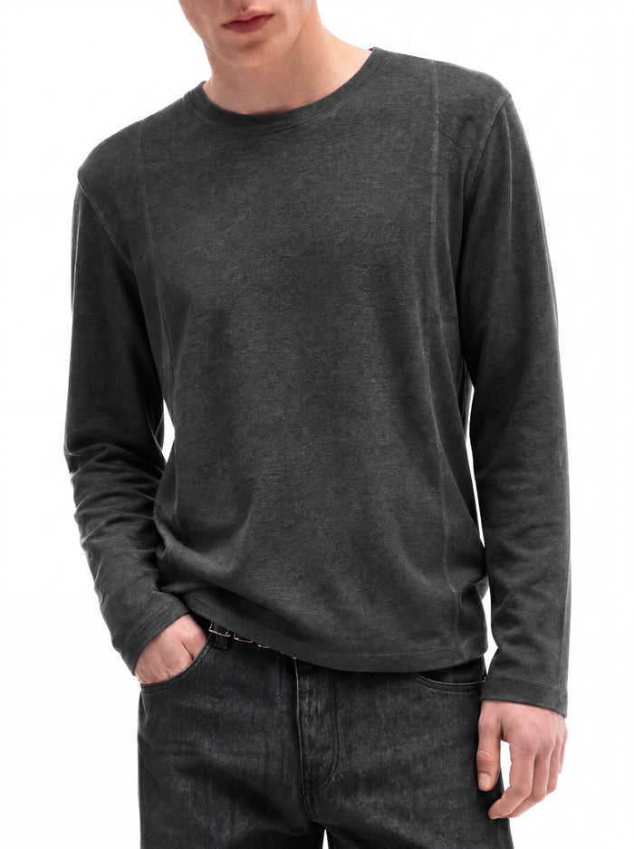 Close front view of a man wearing a charcoal gray long-sleeve crew neck shirt