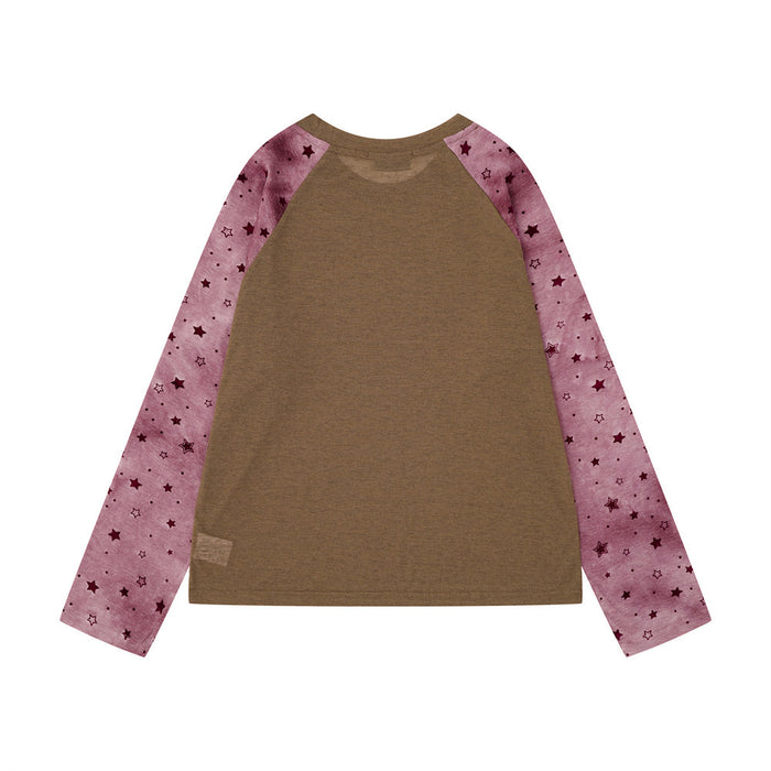 Back view of a brown raglan shirt with pink star-print sleeves and a plain body