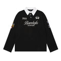 Black long-sleeve rugby polo shirt with white collar, chest lettering, embroidered crest, and sleeve patches front view