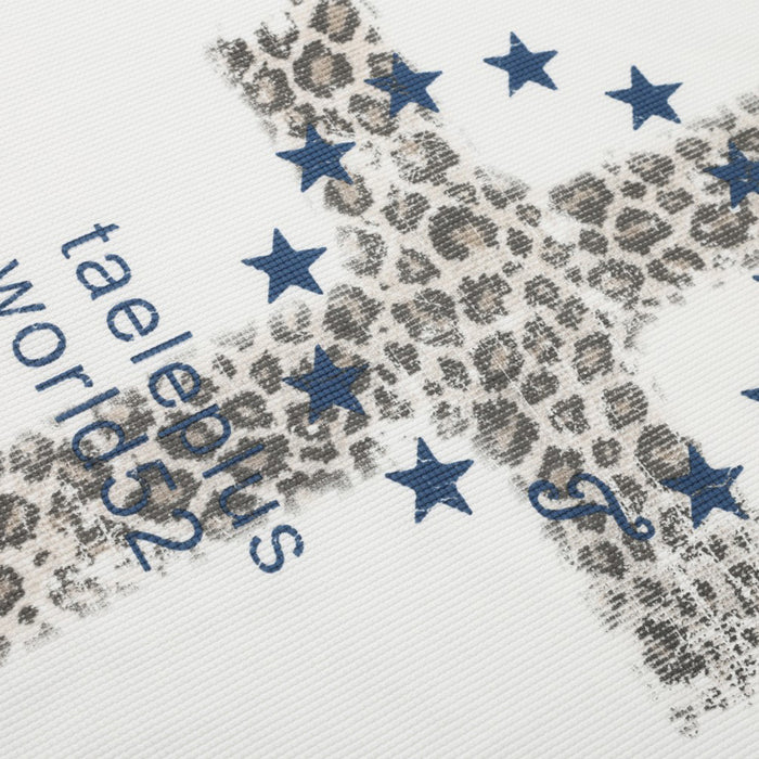 Close-up of the leopard-pattern cross graphic with blue stars and lettering on the white shirt front