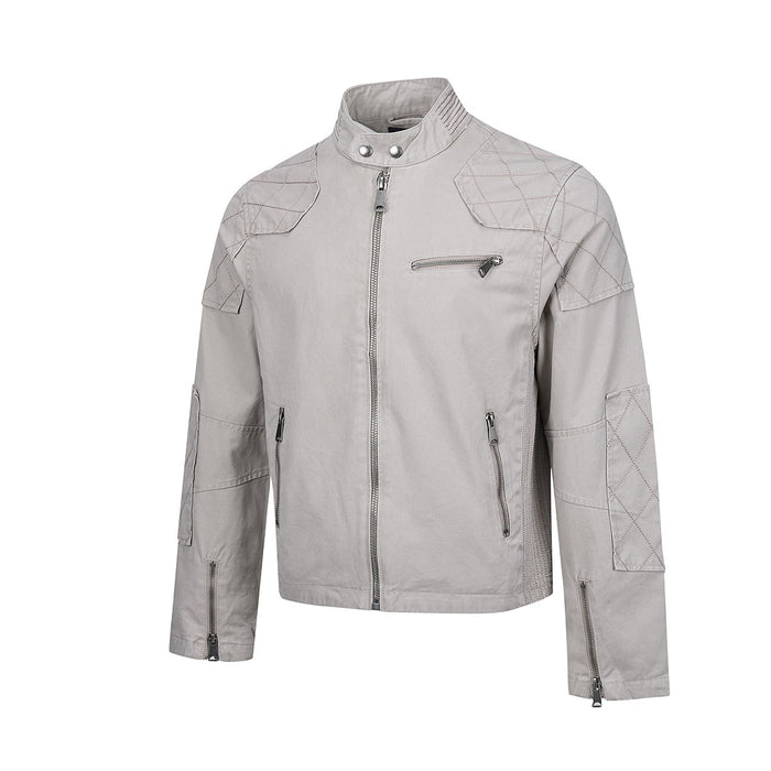 Light gray cotton moto jacket front view with quilted shoulder patches, stand collar, and multiple silver zip pockets