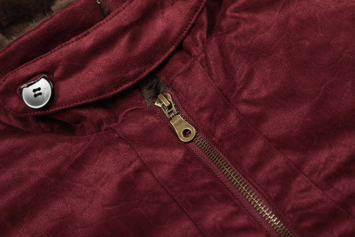 Detail of the burgundy bomber jacket front zipper, snap button, and suede-effect fabric