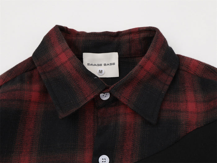 Close-up of the red-black plaid shirt collar, top button, woven fabric, and interior neck label