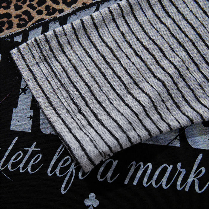 Close-up of the light sleeve showing thin black horizontal stripes over the distressed graphic body