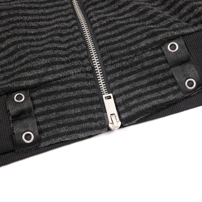Close-up of the jacket hem showing the silver zipper, ribbed edge, and paired grommet tabs