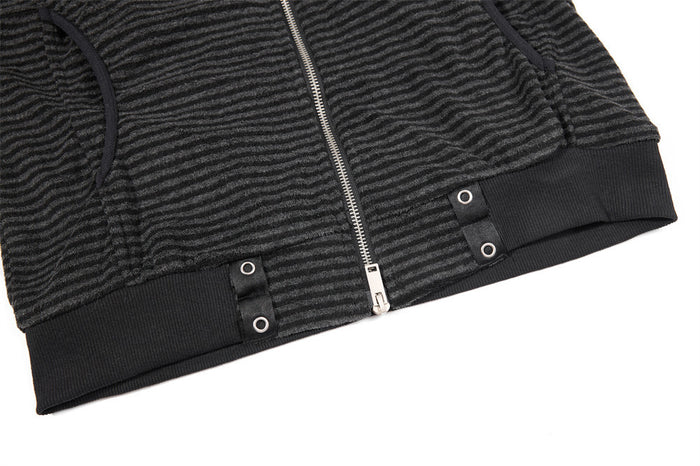 Lower front view of the striped jacket showing zip closure, welt pockets, grommet tabs, and ribbed hem