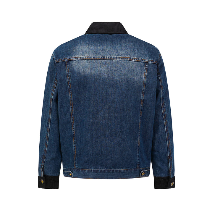 Back view of a blue washed denim jacket with a black corduroy collar and ribbed cuffs
