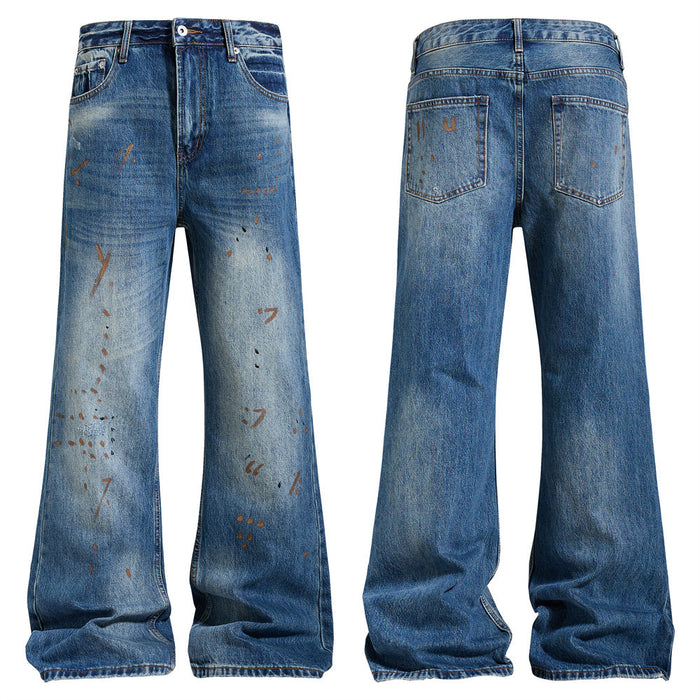 Blue distressed flare jeans shown from front and back with faded washes and brown-black paint splatters