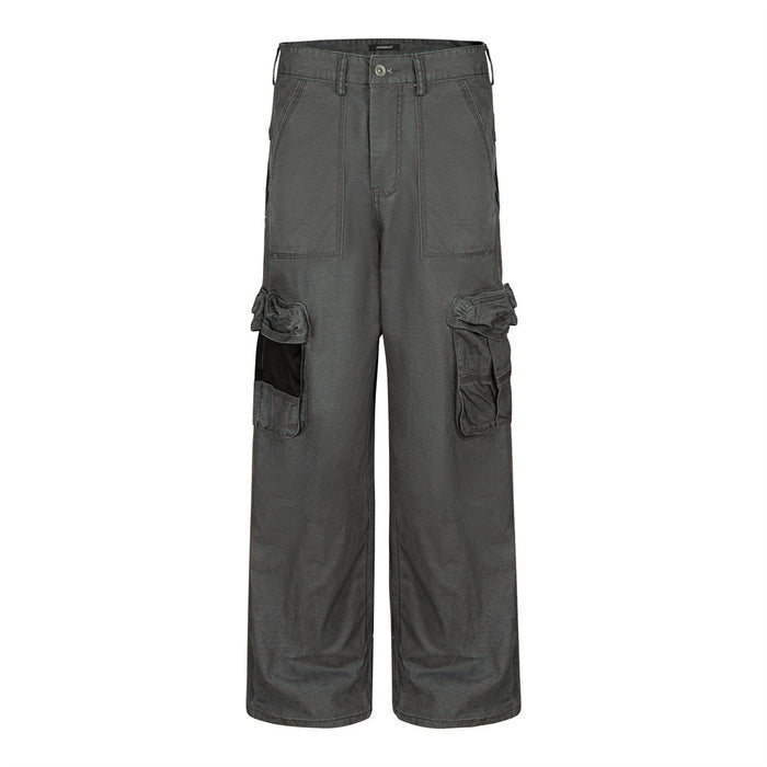 Front view of dark gray wide-leg cargo pants with multiple flap pockets and straight full-length legs