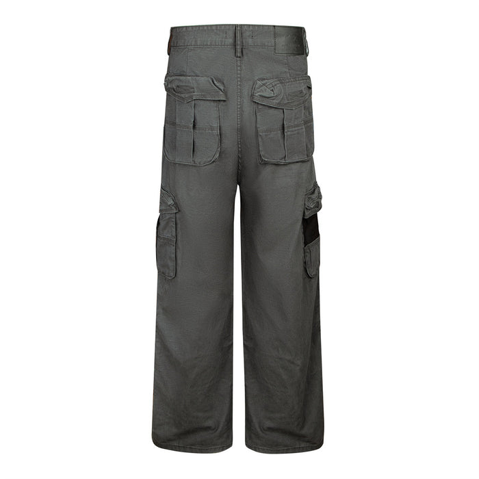 Back view of dark gray cargo pants with two large flap pockets and additional side leg pockets