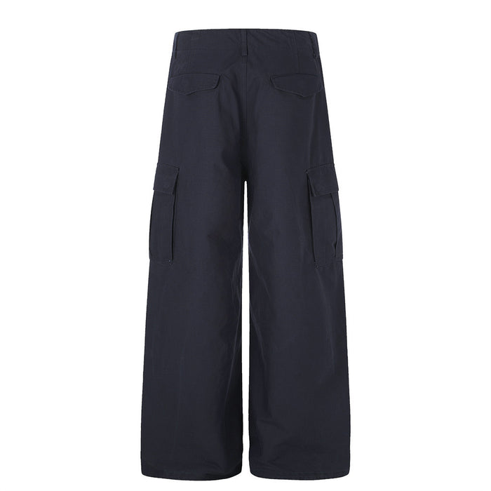 Back view of navy wide-leg cargo pants with flap-back pockets and side cargo pockets