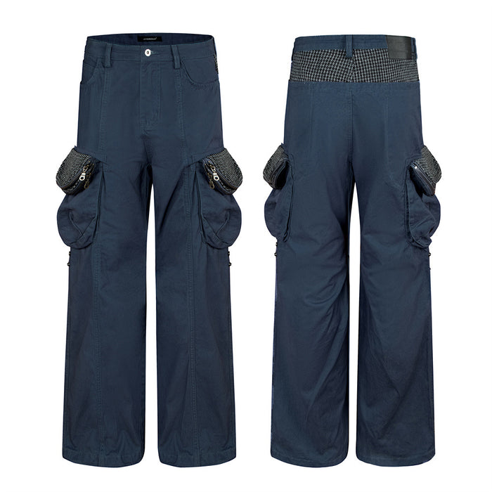 Navy wide-leg cargo pants shown from the front and back with multiple cargo pockets and contrasting patterned waistband panels