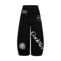 Men's wide-leg graphic sweatpants in black with CoolArt letter print, star emblem, and sun motif on baggy streetwear silhouet